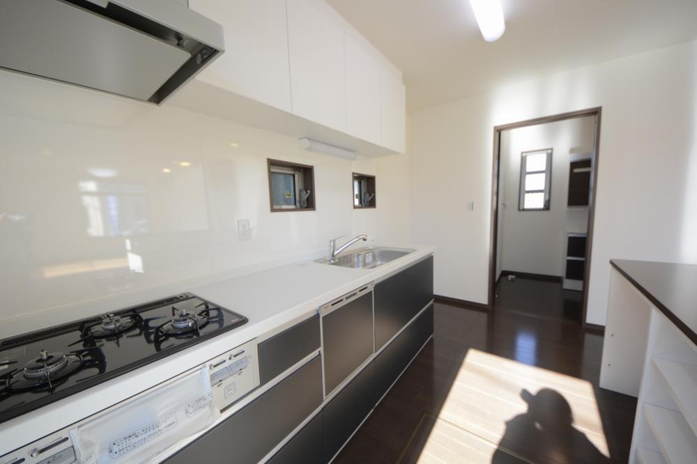 Kitchen. There is also a dishwasher.