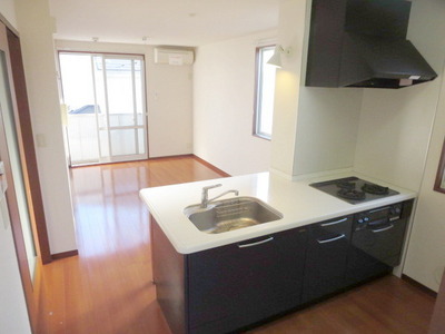 Living and room. Bright living room of counter kitchen