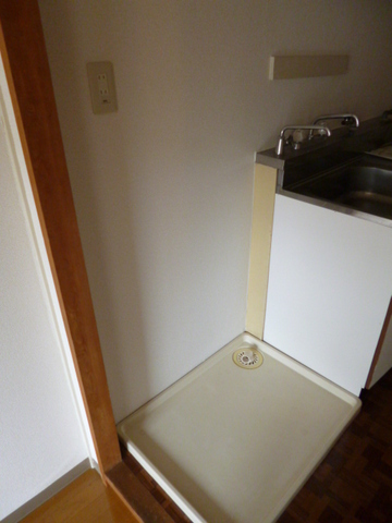 Other Equipment. Washing machine in the room