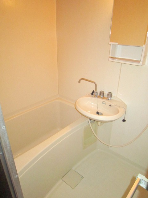 Bath. It is a bathroom with cleanliness