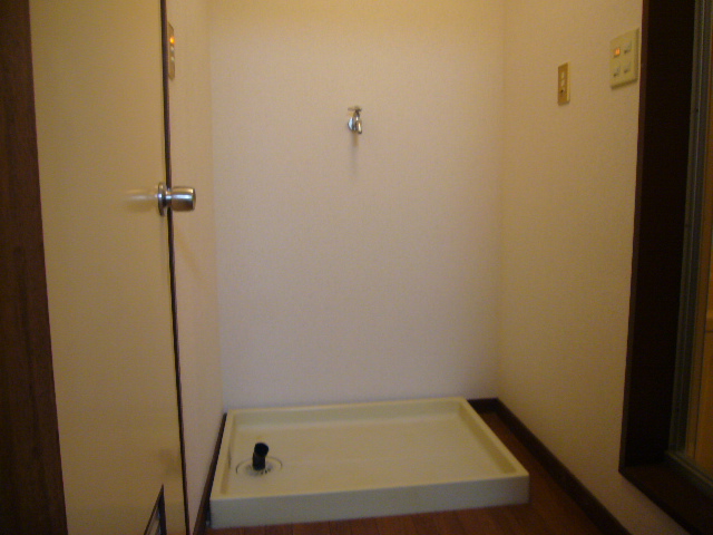 Other Equipment. Washing machine in the room