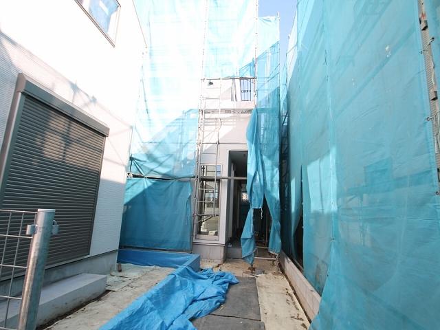 Local appearance photo. Building 2 (center back) Under construction