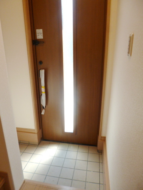 Entrance. With a large shoe box