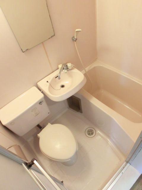 Bath. It is a three-point unit bath with a wash basin.