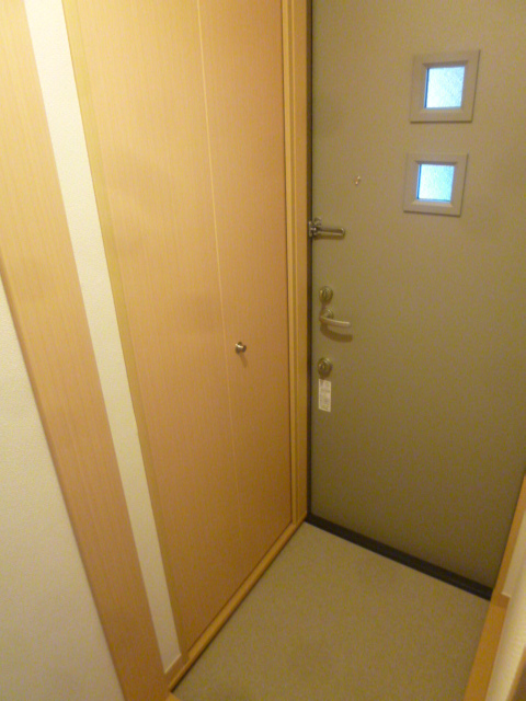 Entrance. There is also a shoe rack