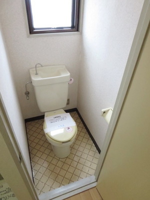 Toilet. There is a window in the toilet