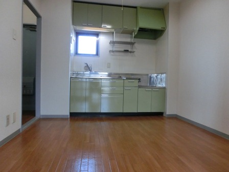 Living and room. DK, There is a window in the kitchen