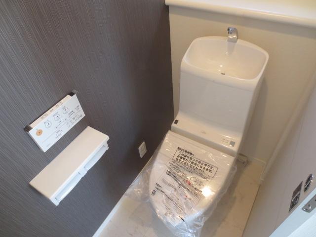 Local appearance photo. Building B Bidet function toilet