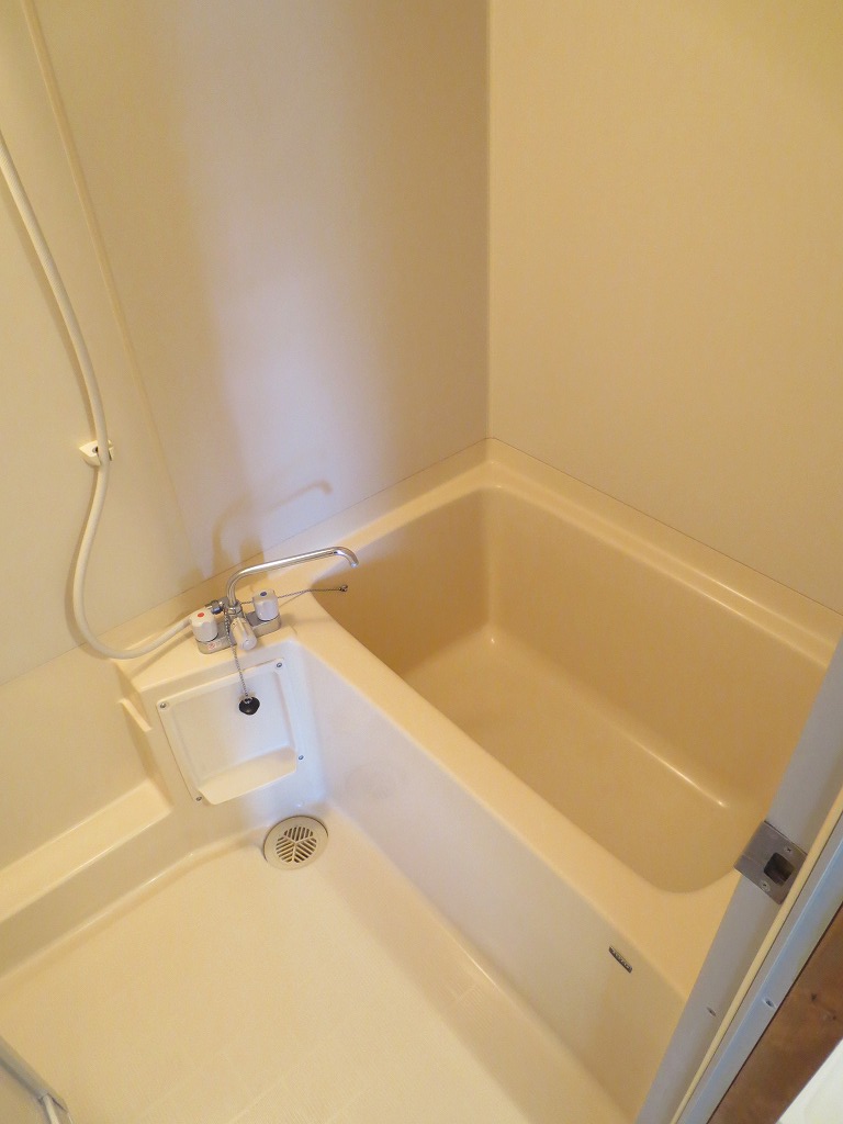 Bath. It is a bathroom with cleanliness