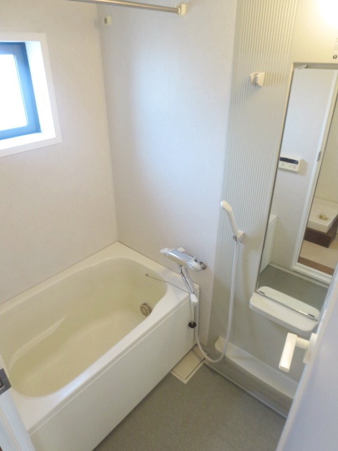 Bath. It is a bathroom with a window