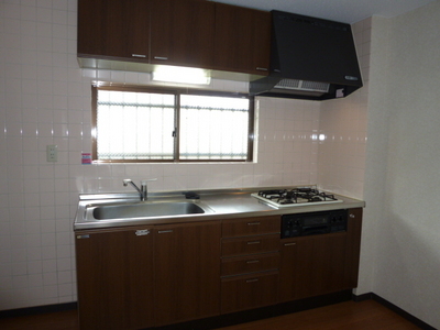 Kitchen. Gas stove installed base of kitchen