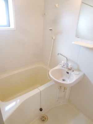 Bath. There is a window in the bath