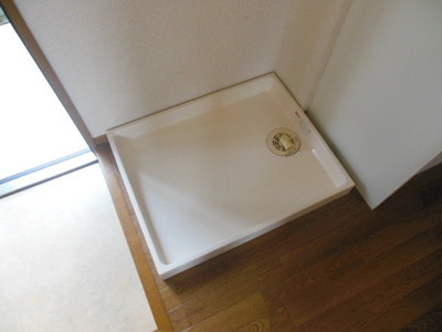 Other Equipment. Washing machine in the room