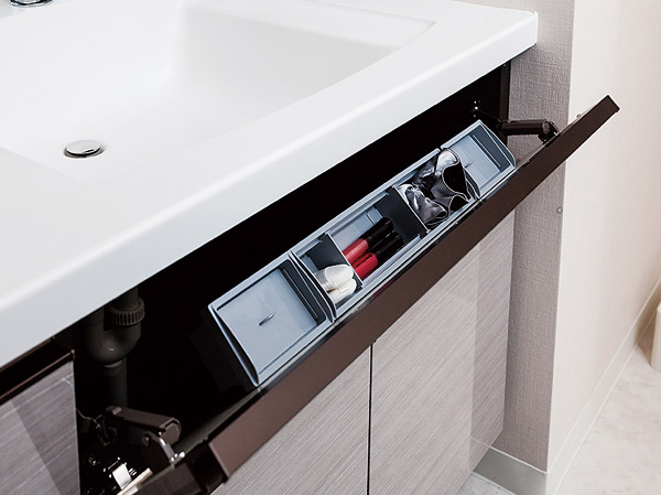 Bathing-wash room.  [Bowl before swing pocket] The storage of the pocket type provided in front and out easily bowl, Like can clean houses the cosmetic accessories.