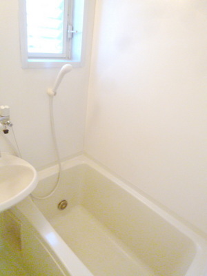 Bath. There is a window in the bath