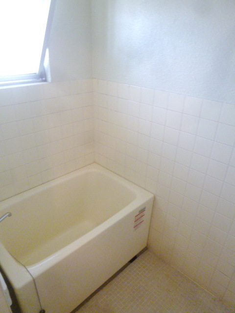 Bath. There is a window in the bath