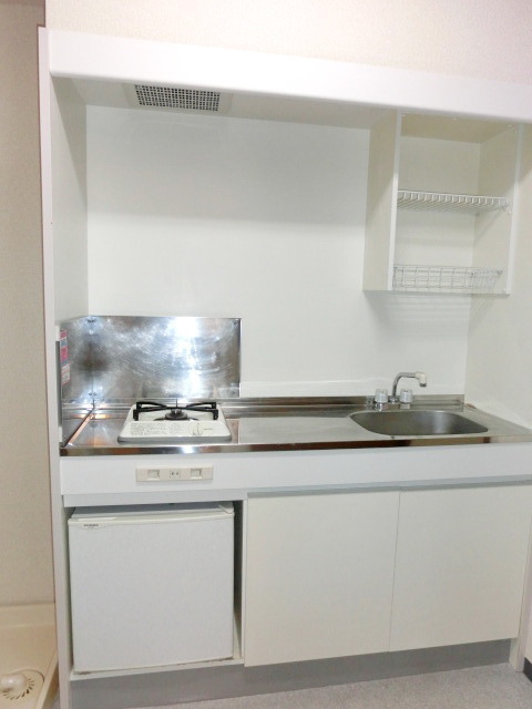 Kitchen. You can see are thinking that the woman looking at the cooking space