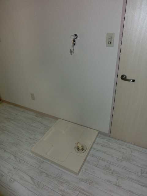 Other Equipment. Washing machine in the room