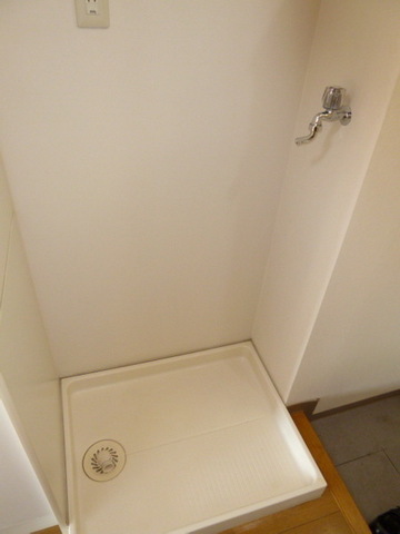 Other Equipment. Washing machine in the room