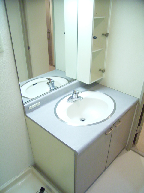 Washroom. Washing machine in the room in the wash room. (Separate reference photograph)