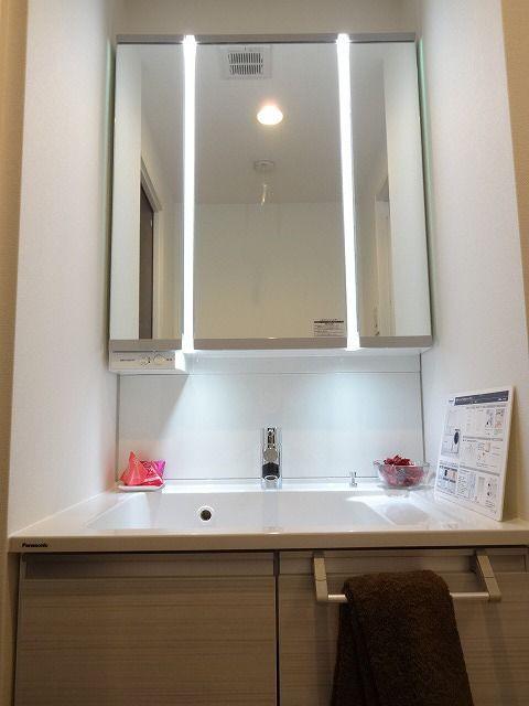 Wash basin, toilet. Bathroom vanity