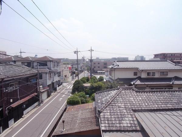 View photos from the dwelling unit. 1 Building view from the third floor balcony