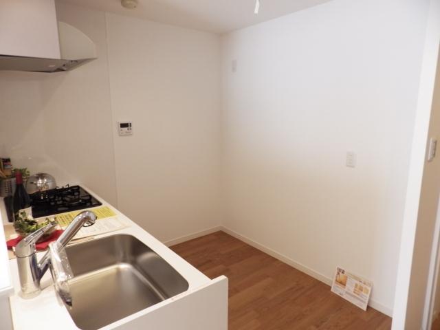 Kitchen. Fridge and cupboard space.