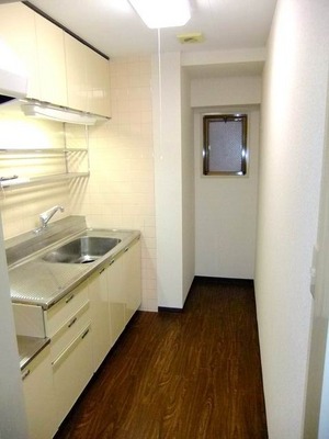 Kitchen. There is a window in a separate space