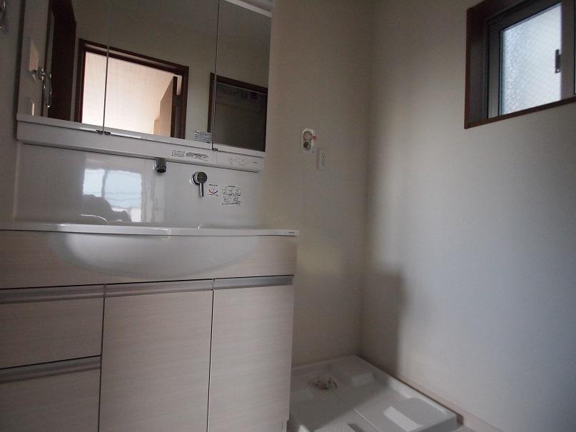 Wash basin, toilet. - There is also linen cabinet on the back (storage) -