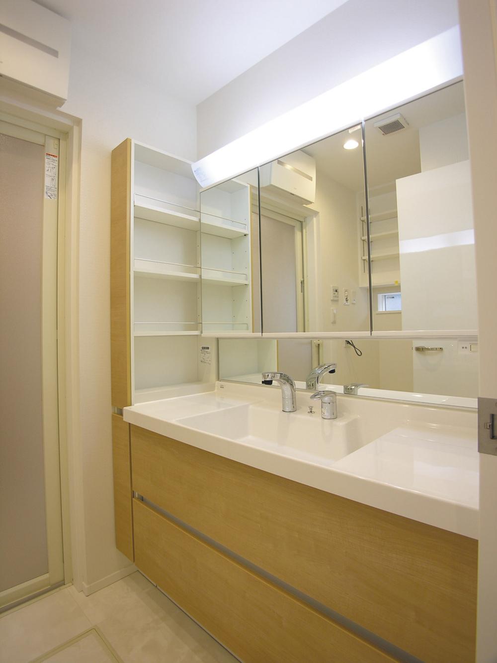 Wash basin, toilet. Vanity (plenty with storage)