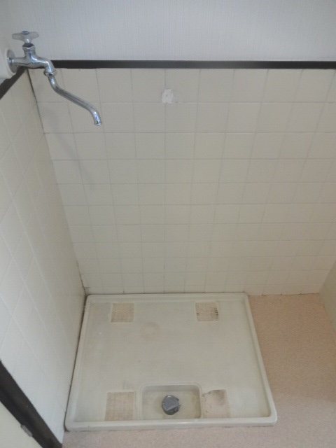 Other Equipment. Washing machine in the room