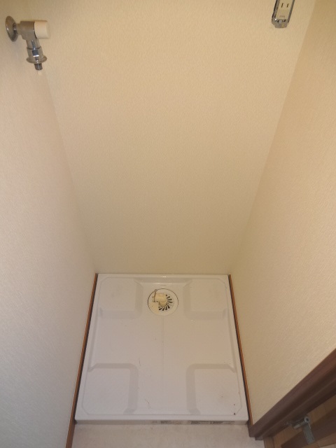 Other Equipment. Washing machine in the room