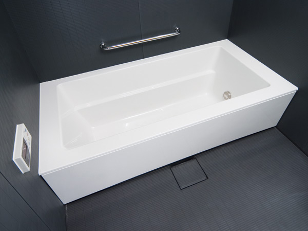 Bathing-wash room.  [Large unit bus] Serving bathing leisurely, About 1.4m × 1.8m ・ It has adopted a large unit bus of about 1.6m × 2.0m. In low-floor type with consideration to safety, Floor Flagstone floor, The wall is a neo Celite panel.