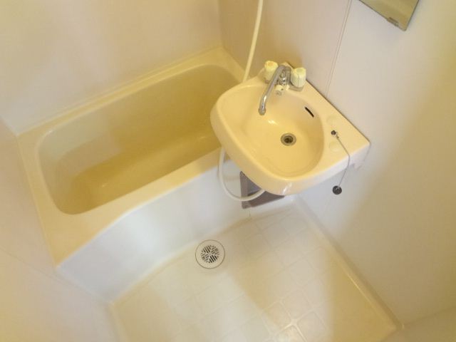 Bath. It is a bathroom with cleanliness