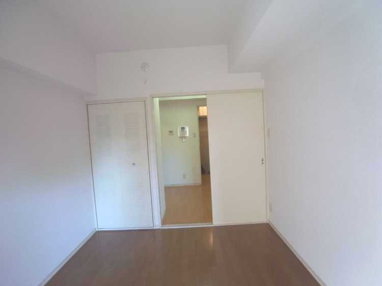 Living and room. There are also door between the entrance and the kitchen