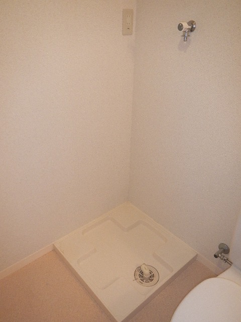 Other Equipment. Washing machine in the room