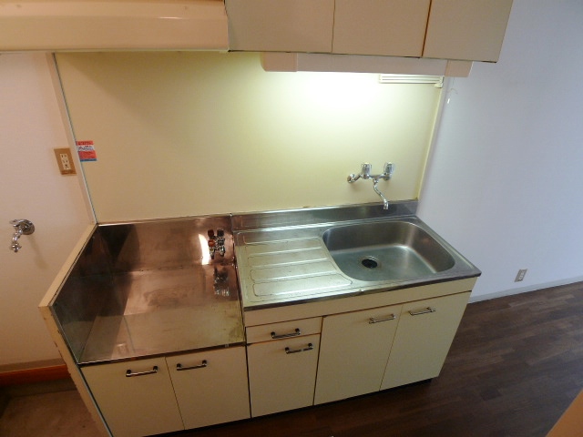 Kitchen. Two-burner gas stove is a corresponding kitchen. 