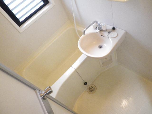 Bath. There is a window in the bath