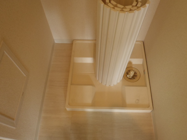 Other room space. Washing machine in the room