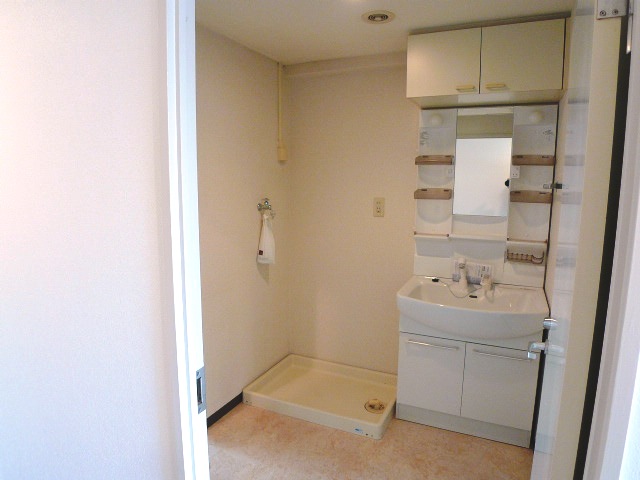 Washroom. There is hard to damage the washing machine because the yard indoor washing machine.