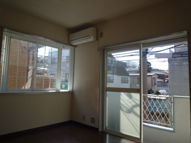 Living and room. It is a photograph of another room