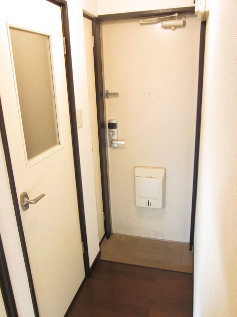 Entrance. Shoe box there key card key