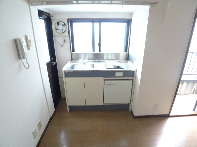 Kitchen. There is a window in the kitchen