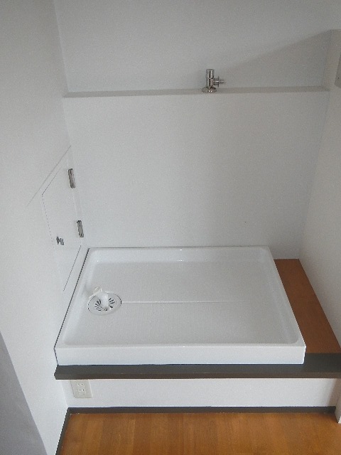 Other Equipment. Washing machine in the room