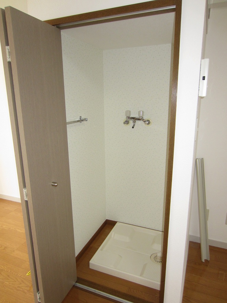 Other Equipment. Washing machine in the room