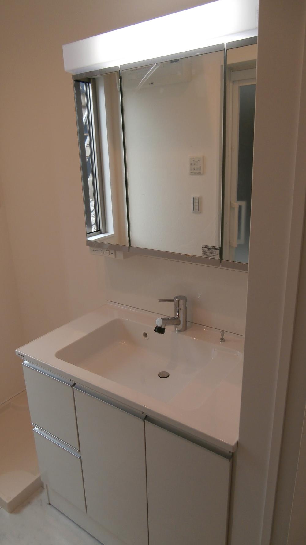 Wash basin, toilet. Bathroom vanity