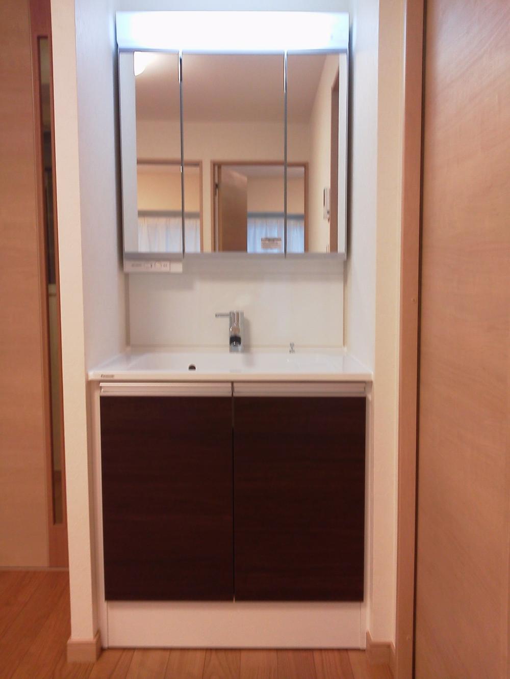 Wash basin, toilet. Bathroom vanity