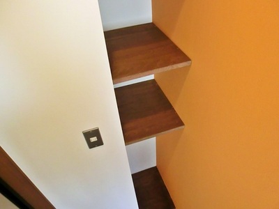 Entrance. A little shelf are provided on the front door next to