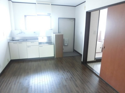 Living and room. About 4 Pledge of kitchen floor