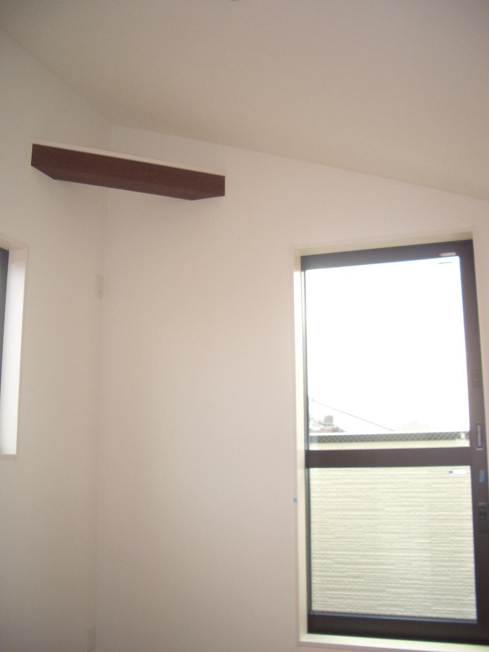 Non-living room. Two a bedroom on the third floor has a higher ceiling. 